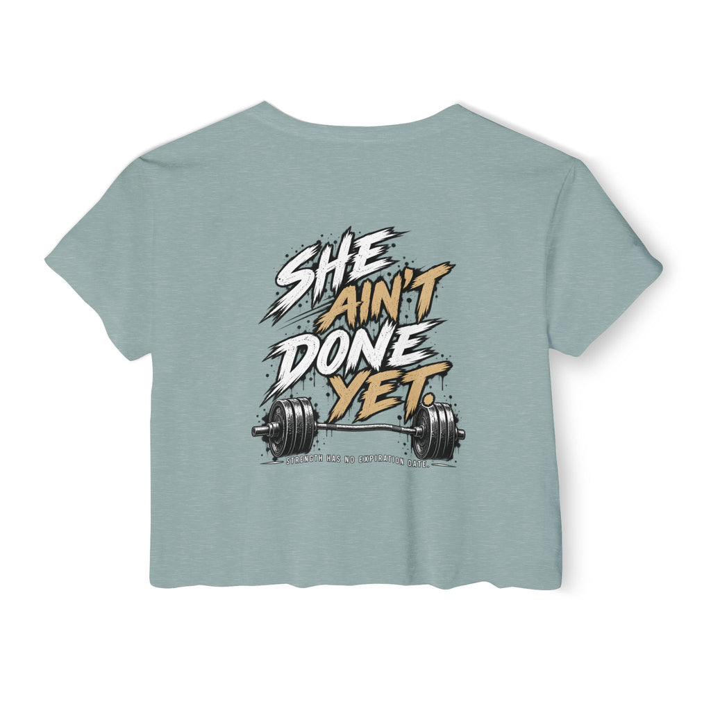 Women's Cropped Tee — "She Ain't Done Yet" Fitness Graphic